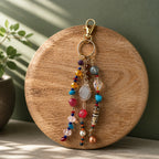 Ariel La Boutique bohemian beaded keychain with multi-colored crystals, polished stones, and a gold-tone lobster clasp.