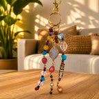 Ariel La Boutique bohemian beaded keychain with multi-colored crystals, polished stones, and a gold-tone lobster clasp.