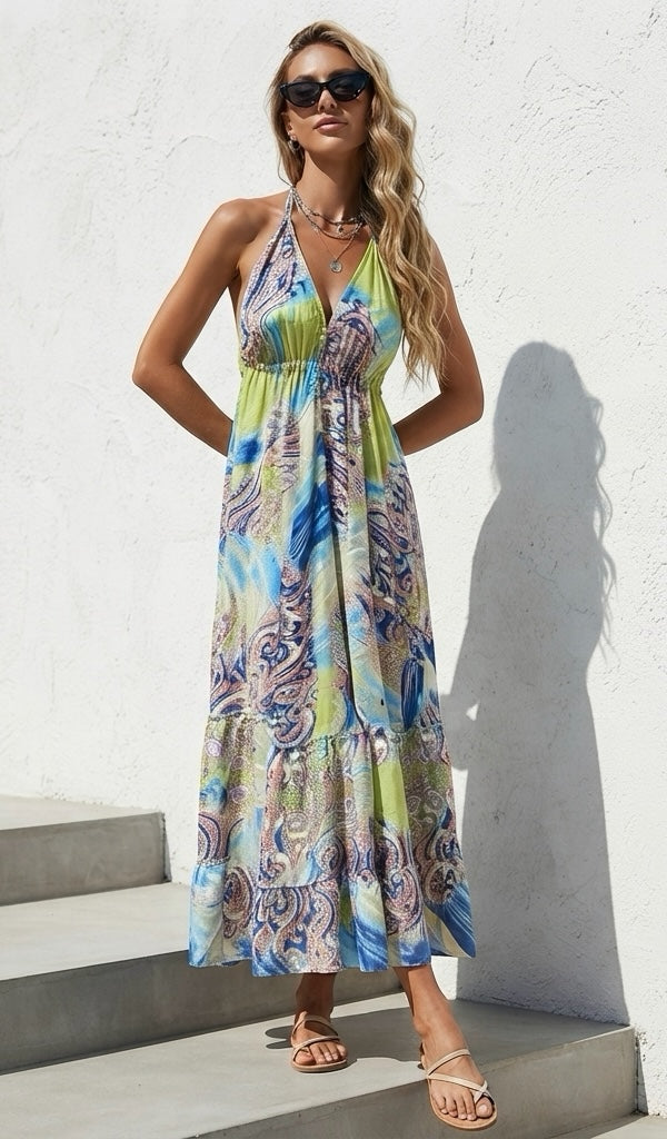 Ariel La Boutique bohemian halter neck maxi dress in lime green and blue paisley print with a tiered flowy skirt.